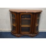 A MODERN MAHOGANY CREDENZA with triple glass doors, with a later brown leather top, width 132cm x