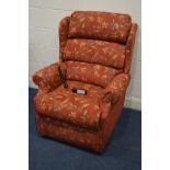 A FLORAL UPHOLSTERED ELECTRIC RISE AND RECLINE ARMCHAIR (PAT pass and fully working)