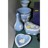 FIVE PIECES OF WEDGWOOD PALE BLUE JASPERWARE, including a heart shaped trinket dish and cover, a