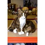 TWO LARGE MIKE LINTON POTTERY CATS, one seated, height 29cm (ear restored) and the other lying,