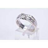 A 9CT WHITE GOLD DIAMOND SOLITAIRE RING AND CROSSOVER ETERNITY RING, which have been soldered
