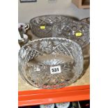 THREE CIRCULAR CUT GLASS FRUIT BOWLS, all unbranded, rim to rim diameters 21cm, 18cm and 24.5cm (3)