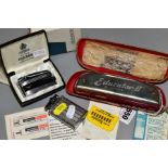 A CASED HOHNER EDUCATOR II HARMONICA, together with two Roson lighters, one boxed and one,