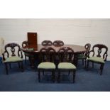 A REPRODUCTION VICTORIAN STYLE MAHOGANY WIND OUT TABLE, with rounded ends, two additional leaves