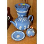WEDGWOOD PALE BLUE JASPERWARES, comprising a teapot, a vase with frog insert, height 17cm, a