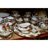 ROYAL ALBERT 'OLD COUNTRY ROSES' A TWELVE PLACE DINNER SERVICE, to include cups, saucers, side