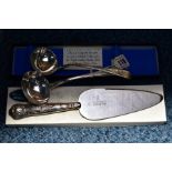 A PAIR OF GEORGE III SILVER OLD ENGLISH SAUCE LADLES, engraved lion head crests, makers William