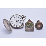 A POCKET WATCH AND TWO PENDANTS, the plain polished white metal full hunter pocket watch, cracked