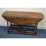 AN EARLY TO MID TWENTIETH CENTURY OAK TOPPED BARLEY TWIST GATE LEG TABLE, width 136cm x open depth