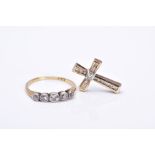 A DIAMOND RING AND CROSS PENDANT, the yellow metal ring set with five graduated old cut diamonds,