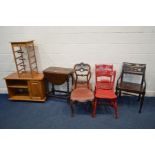 A SMALL OAK SWIVEL TOPPED DROP LEAF TABLE, together with a pine TV stand, hardwood open armchair,