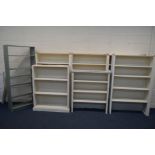 SIX WHITE PAINTED BESPOKE OPEN BOOKCASES of various sizes, together with another open bookcase (7)