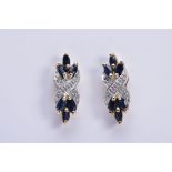 A PAIR OF 9CT GOLD SAPPHIRE AND DIAMOND DROP EARRINGS, each designed with a central cross design set