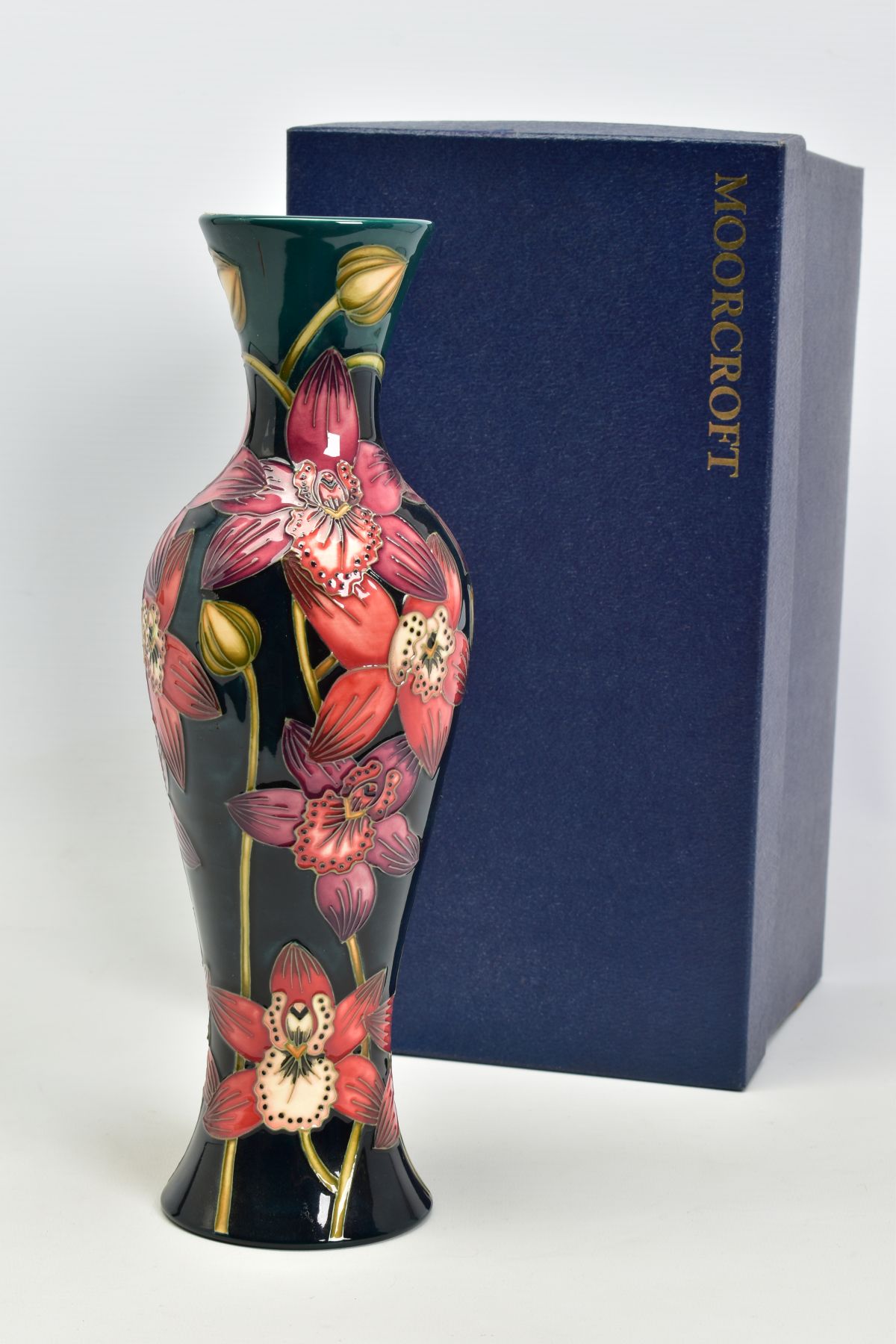 A BOXED MOORCROFT POTTERY VASE, from Connoisseur collection June 2004, 'Porelet Bay', pink and red