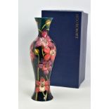A BOXED MOORCROFT POTTERY VASE, from Connoisseur collection June 2004, 'Porelet Bay', pink and red