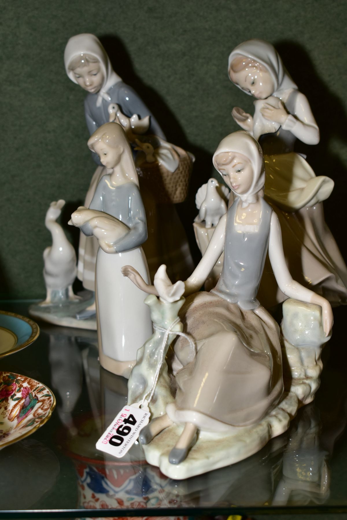 FOUR LLADRO FIGURINES, comprising girl reclining on ground with dove seated on a branch, a young - Image 2 of 5