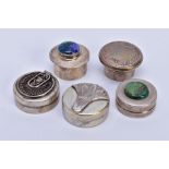 A COLLECTION OF FIVE WHITE METAL ASSORTED PILL CASES round in shape and of various sizes, one blue