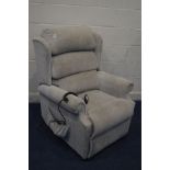 AN OATMEAL UPHOLSTERED ELECTRIC RISE AND RECLINE ARMCHAIR (PAT pass and fully working)