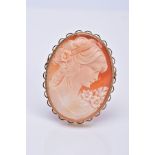 A MODERN 9CT GOLD CAMEO SHELL BROOCH, depicting a maiden in profile, measuring approximately 46mm