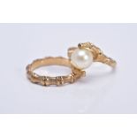 A LATE 20TH CENTURY CULTURED PEARL SINGLE STONE RING, crossover design to a textured bamboo design