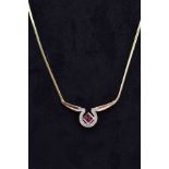 A MODERN RUBY AND DIAMOND CENTRE PIECE NECKLET, fitted to a herringbone link chain, measuring