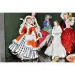 FIVE ROYAL DOULTON FIGURINES, comprising 'Christmas Day' HN3488, 'Noelle' HN2179, 'Autumn Breezes'