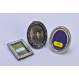 THREE SMALL SILVER MOUNTED AND PLATED PHOTOGRAPH FRAMES, rectangular frame lacks easel, inner