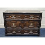 AN OAK CHEST OF THREE LONG DRAWER, of late 17th century style, incorporating timbers possible of the