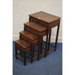 A MID 20TH CENTURY CHINESE HARDWOOD QUARTETTO NEST OF FOUR TABLES, carved shou fretwork, largest