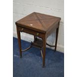 AN EDWARDIAN MAHOGANY AND STRUNG ENVELOPE CARD TABLE, with a single drawer, on square tapering