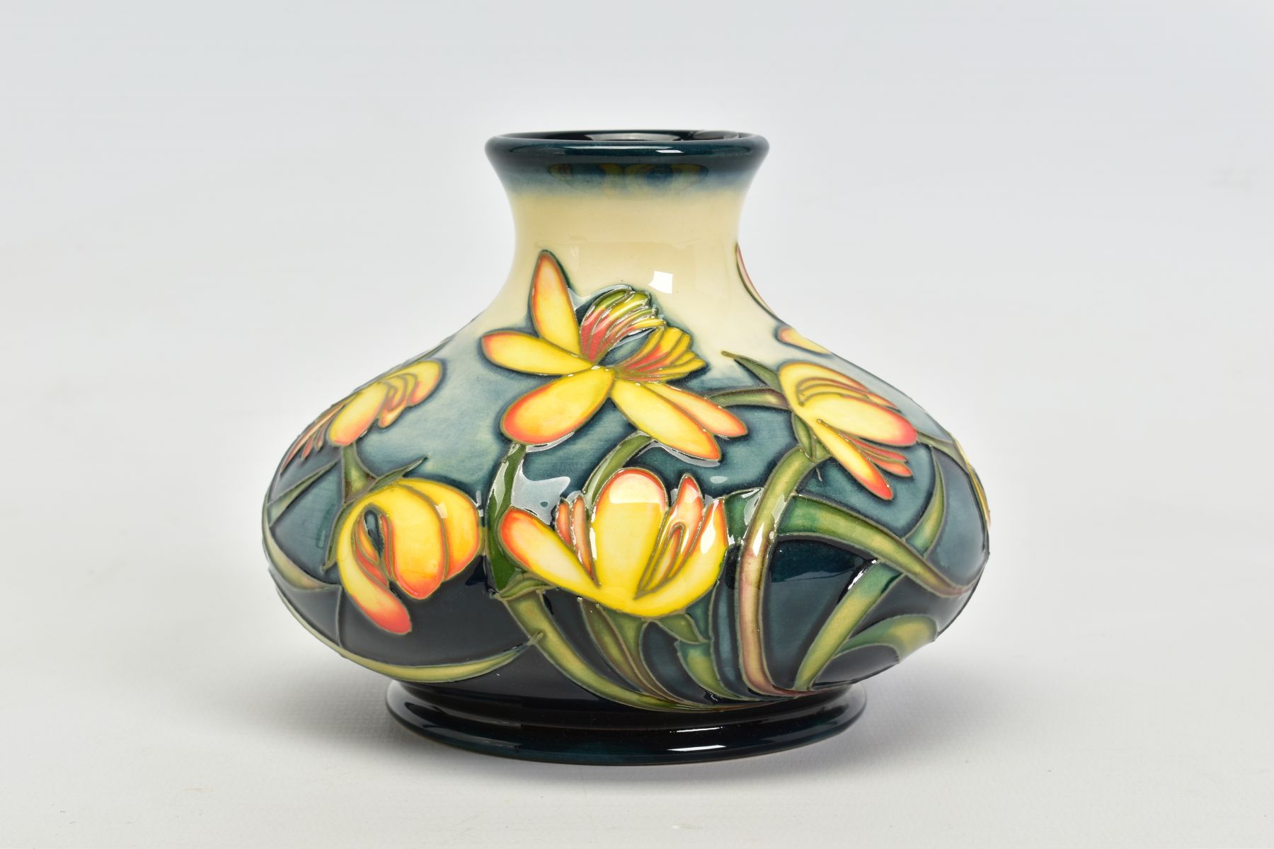 A MOORCROFT POTTERY SQUAT VASE 'Celandine', pattern by Emma Bossons, impressed backstamp, painted No