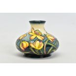 A MOORCROFT POTTERY SQUAT VASE 'Celandine', pattern by Emma Bossons, impressed backstamp, painted No