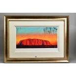 ROLF HARRIS (AUSTRALIAN 1930) 'ULURU SUNSET, DESERT OAKS', a limited edition print of the Australian