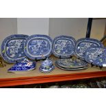 FIVE WILLOW PATTERN BLUE AND WHITE PLATTERS, length approximately 41cm, two drainers, tureen with