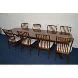 SVEND A MADSEN DANISH ROSEWOOD DINING TABLE, rounded ends on triple framed legs, two additional