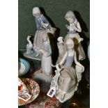 FOUR LLADRO FIGURINES, comprising girl reclining on ground with dove seated on a branch, a young