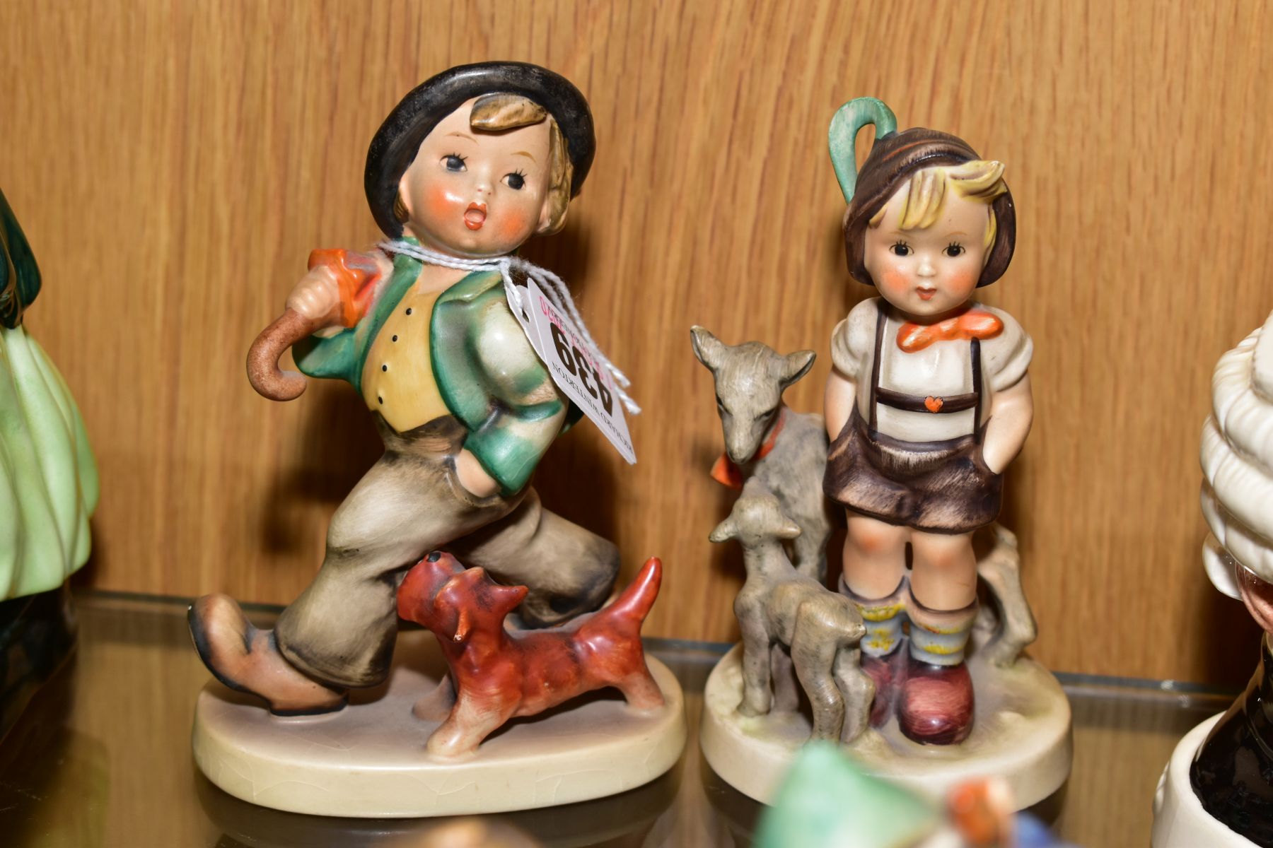 FOUR HUMMEL FIGURES 'Strolling Along HUM5, 'Happy Pastime' HUM69, 'Barnyard Hero' HUM195 and 'Little - Image 3 of 3