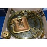 A BOX OF BRASSWARE, etc, including an inkwell, two trivets, a chamberstick, two wall spill holders