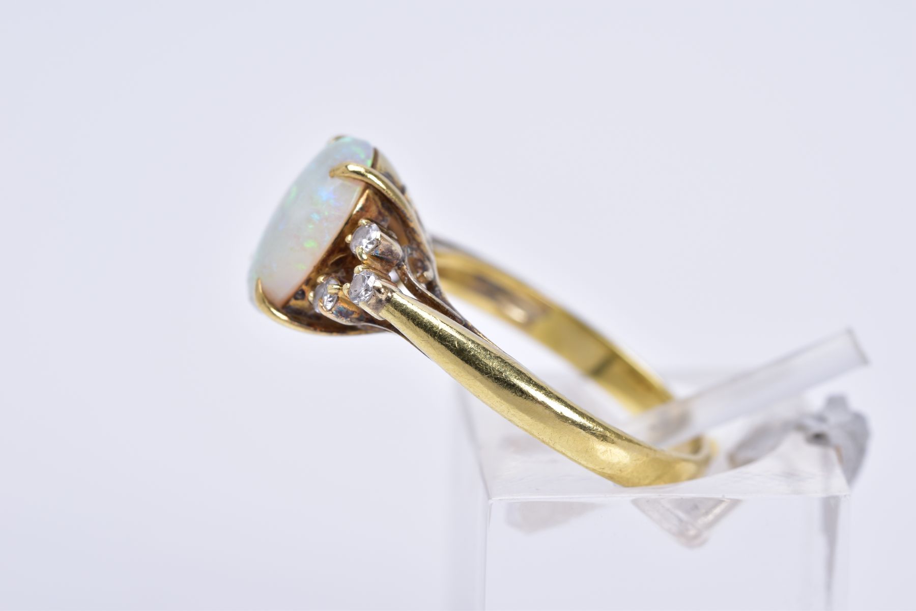 A MODERN OPAL AND DIAMOND DRESS RING, opal measuring approximately 10mm x 7.5mm (condition: small - Image 2 of 3