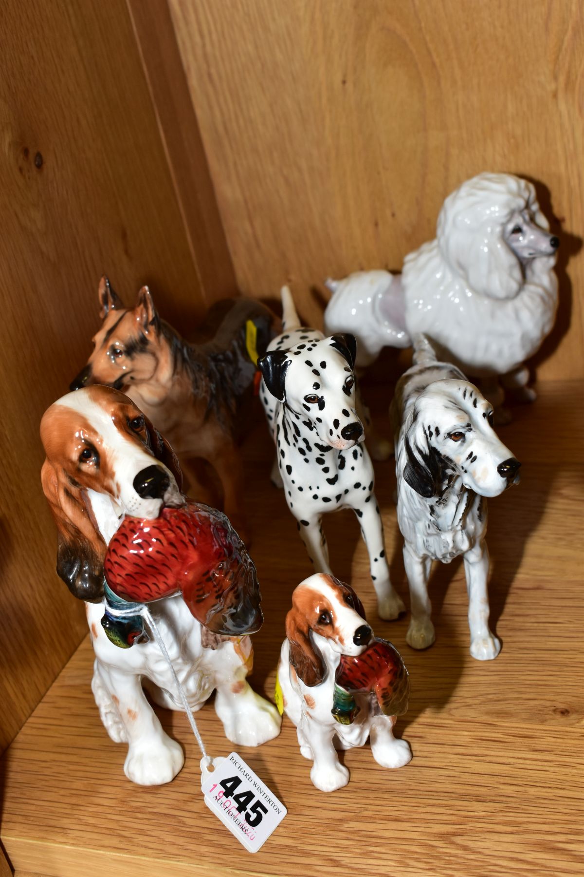 SIX ROYAL DOULTON DOGS 'Cocker Spaniel with Pheasant' HN1001, height 16.5cm, 'Cocker Spaniel with