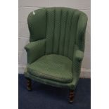 A VICTORIAN GREEN UPHOLSTERED PORTERS CHAIRS on turned mahogany front legs, width 76cm x depth