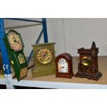 A COLLECTION OF THREE MANTLE CLOCKS AND A WALL CLOCK, including a carved wood clock in the form of a