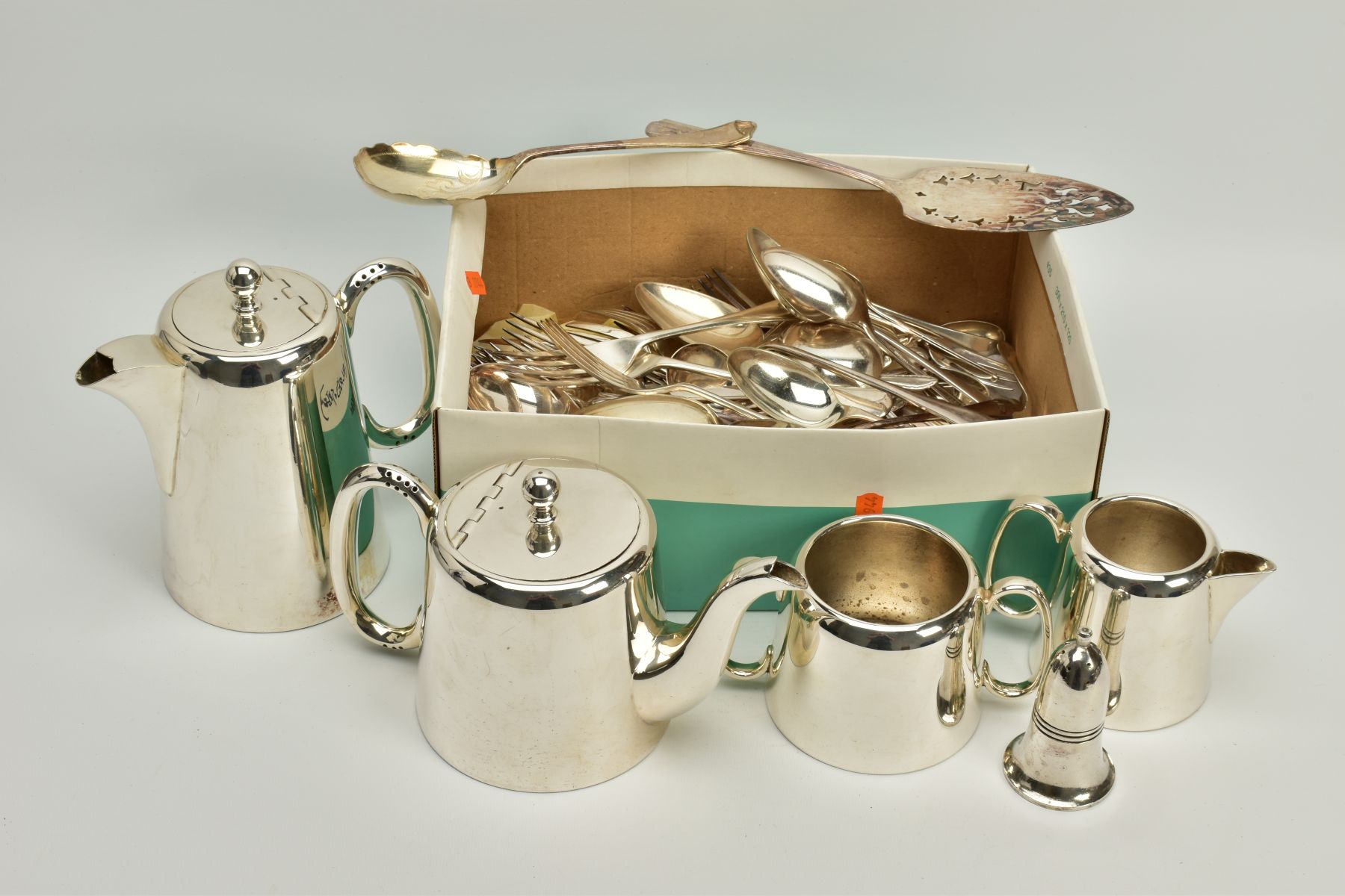 A SELECTION OF METALWARE, to include a white metal coffee pot, teapot, milk jug, sugar pot, a salt