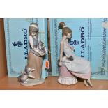 TWO BOXED LLADRO FIGURES, 'Following Her Cats' No. 1309, designed by Juan Huerta, height 24.5cm