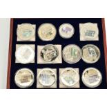 A BOXED TWELVE SET OF WINDSOR MINT BRITISH BANKNOTE COMMEMORATIAVE COIN COLLECTION, housed in a