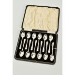 A CASED SET OF TWELVE SILVER GOLFING COFFEE SPOONS, with embossed golf clubs and ball to the handle,