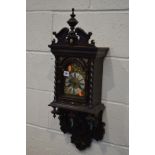 AN EARLY TO MID TWENTHIETH CENTURY OAK WALL CLOCK, with a brass and enamelled dial, height 75cm (