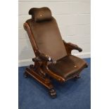 AN EARLY VICTORIAN MAHOGANY MEDICAL/SURGICAL/DENTAL CHAIR, with an adjustable headrest,