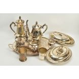 A QUANTITY OF METALWARE, to include items such as a large silver plated oval footed foliate embossed