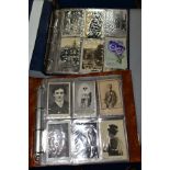 POSTCARDS, two postcard albums containing approximately 230 Edwardian - early 20th century postcards